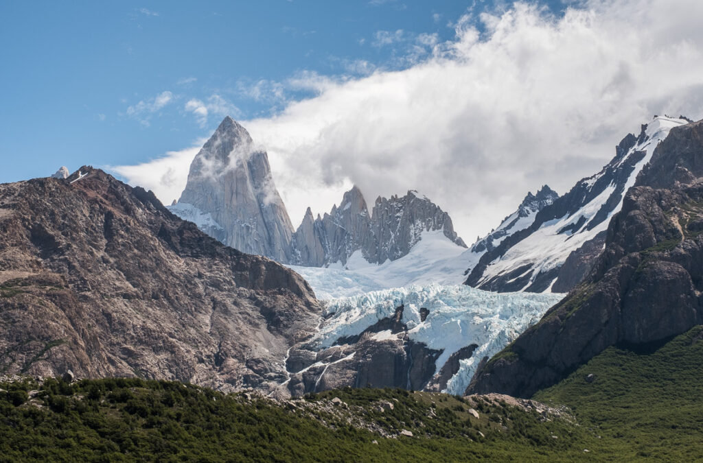 high rock monolith rising above the glacier