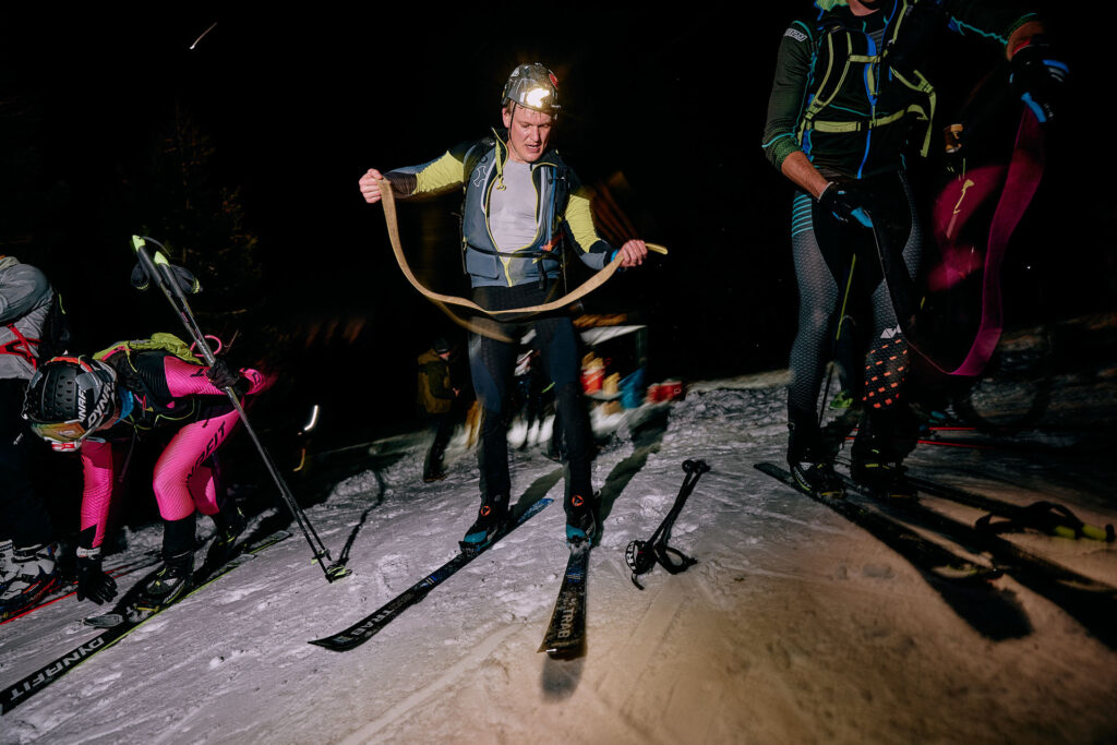 skimo racer splitting his skins