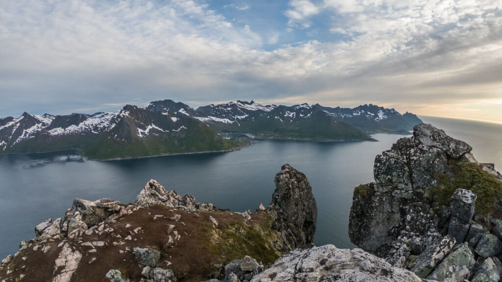 view down the mountain on to the picturesque fjord in Atlantic ocean