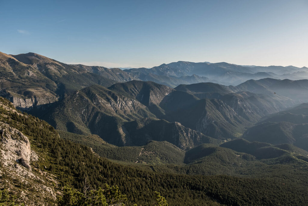 small mountain ridges viewed from the distant height