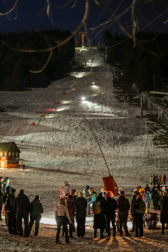 skimo race on the skislope. People descending and ascending