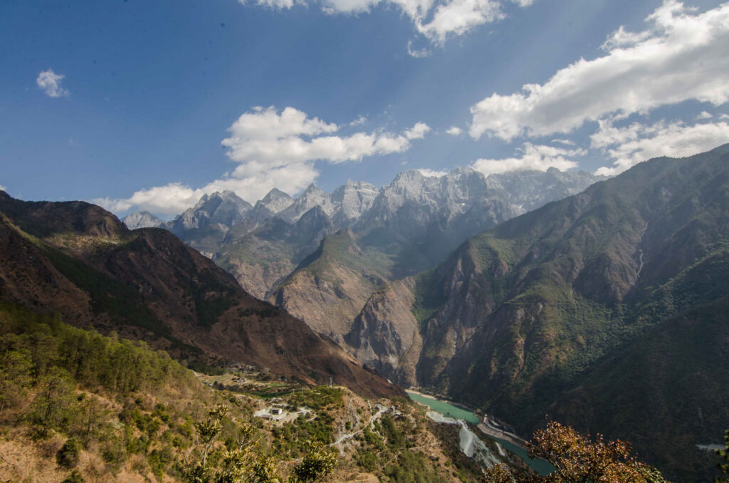 massiv mountains falling down the deep gorge